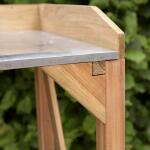 Table de rempotage en bois avec espace de rangement